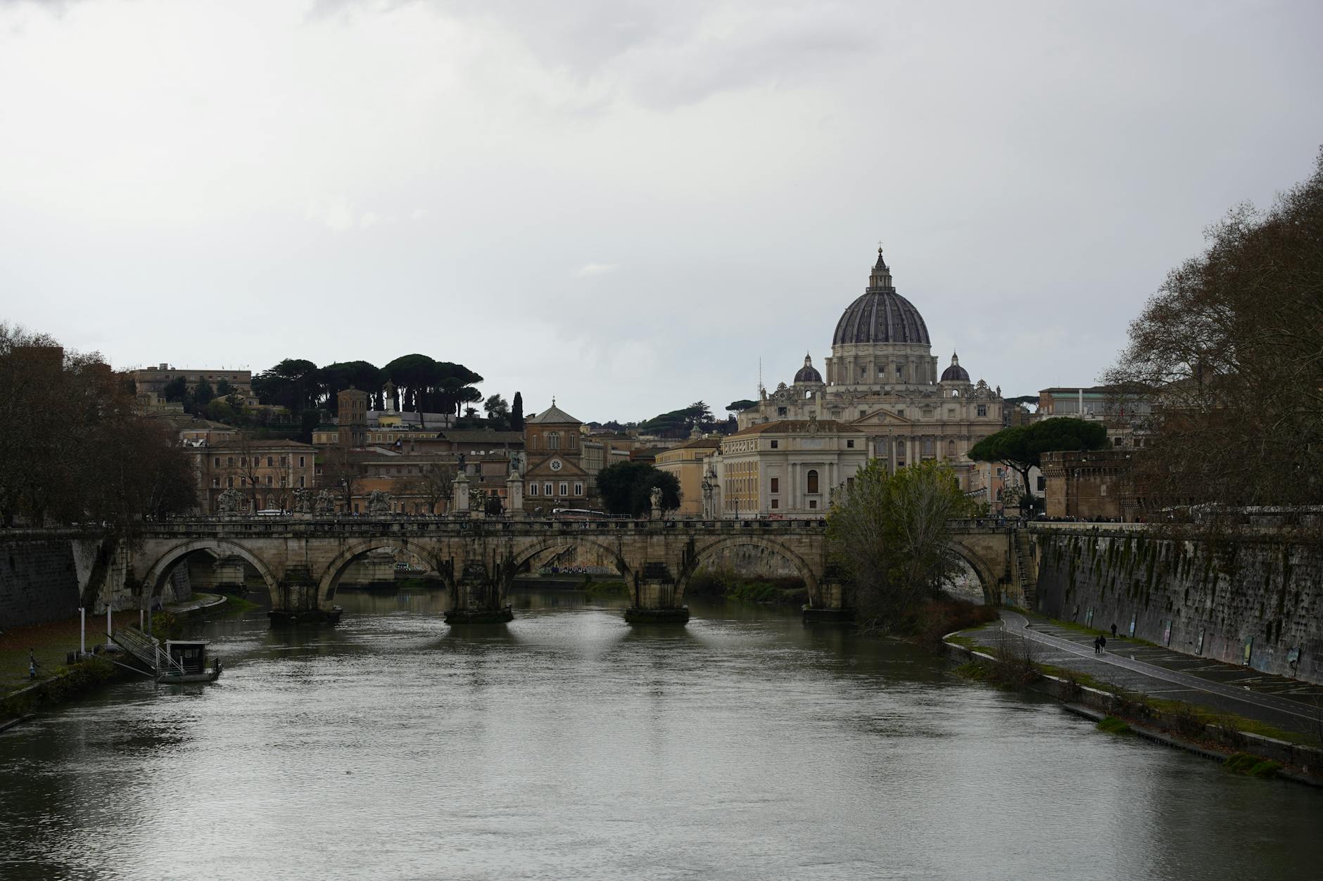 a view of the river and buildings in rome