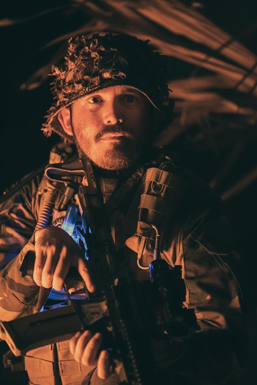 tactical soldier in camouflage at night